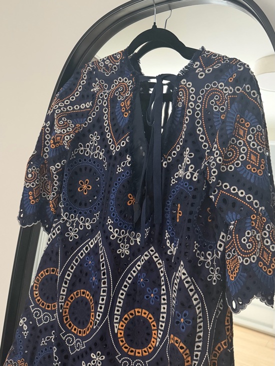 Tory Burch Tops - Tory Burch Navy Eyelet Lace-Up Tunic with Orange & White Embroidery